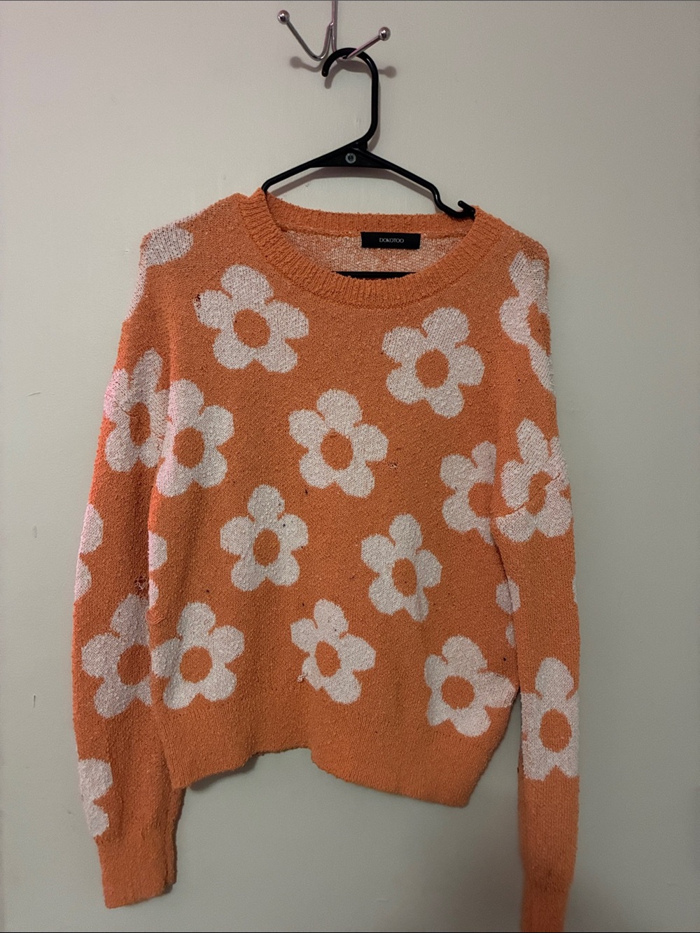 DKNY Orange Crewneck Sweater with White Floral Pattern
